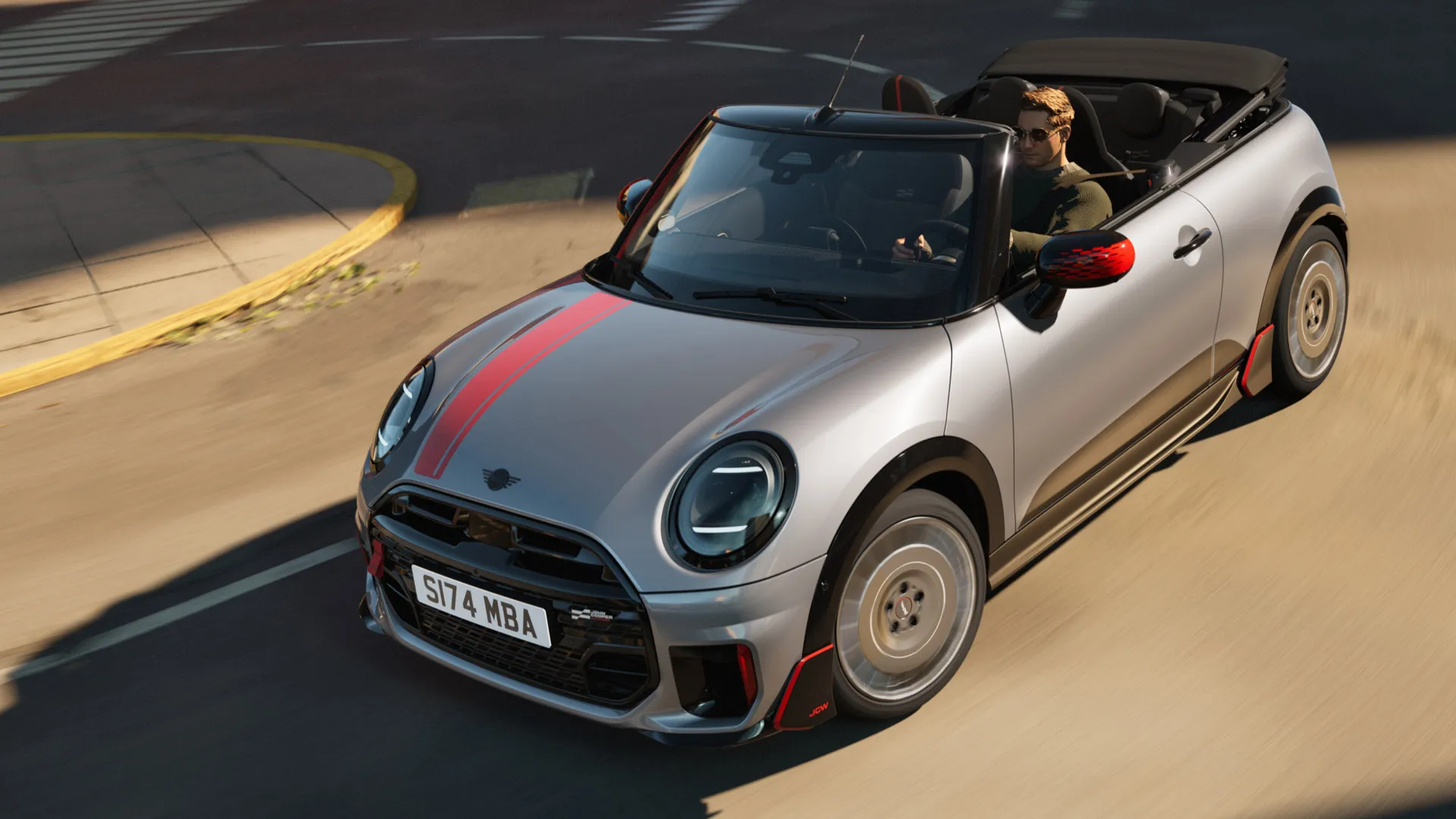 Fronten på en MINI kabriolet med sporty John Cooper Works-foliering i Chili Red sett ovenfra.