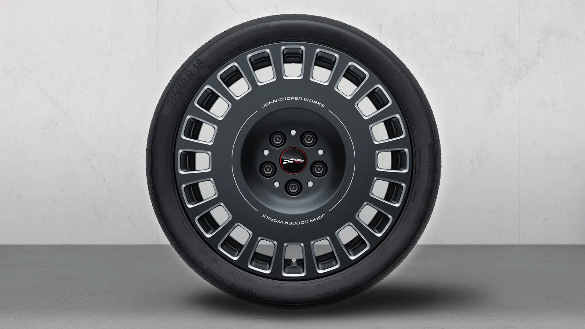 18" John Cooper Works lettmetallfelger Rallye-spoke style 964 komplett sommerhjul i totonet Midnight Grey, diamantkuttet. 