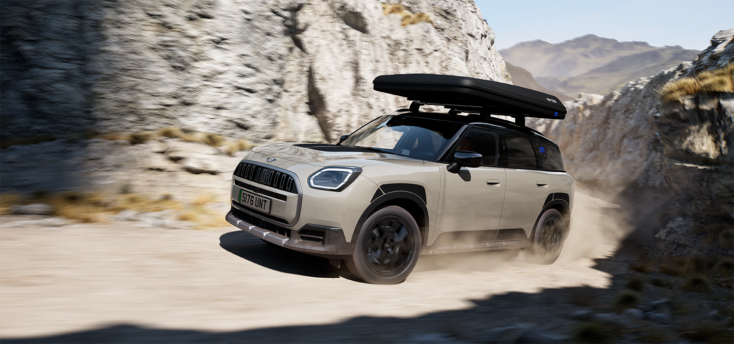 Frontbilde av MINI Countryman Untamed Edition under kjøring.